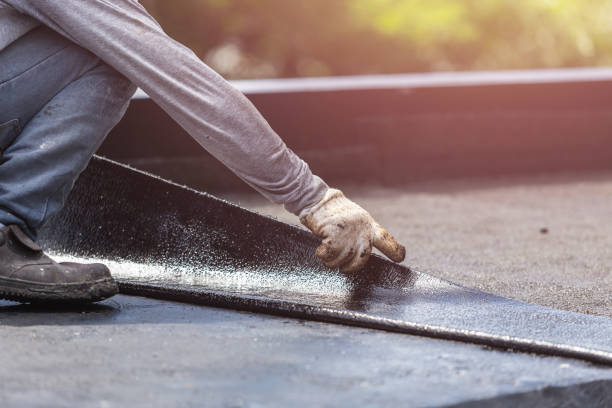 Professional Basement Waterproofing technician working in Manchester, OH